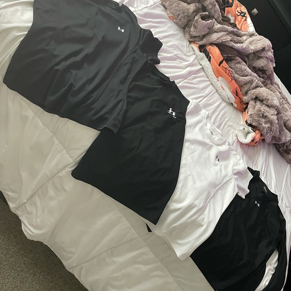 Four Under Armour Shirts